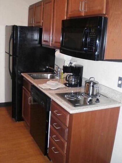 Studio Suite | Private kitchenette | Fridge, microwave, stovetop, dishwasher