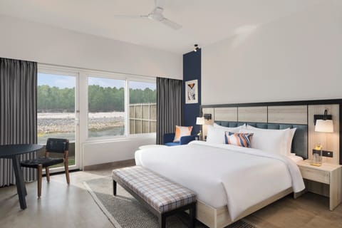 Premium Room, 1 King Bed, River View | Premium bedding, minibar, in-room safe, individually decorated