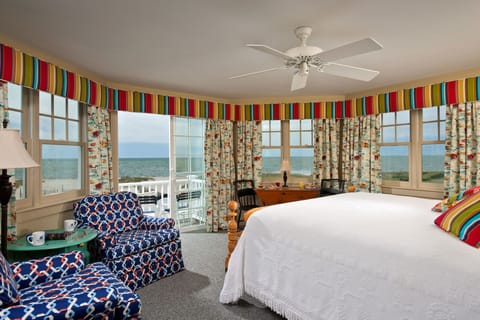 Deluxe Room, 1 King Bed, Balcony, Beach View | Pillowtop beds, individually decorated, individually furnished