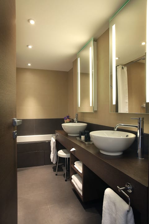 Family Suite, 2 Twin Beds, City View | Bathroom | Eco-friendly toiletries, hair dryer, towels