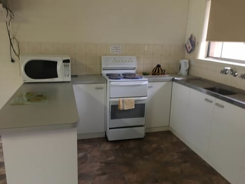 Family Apartment, 2 Bedrooms, Kitchen, River View (Unit 2) | Private kitchen | Full-size fridge, microwave, oven, stovetop