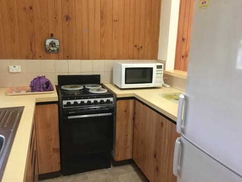 Family Apartment, 2 Bedrooms, Kitchen, Garden View (Unit 6) | Private kitchen | Full-size fridge, microwave, oven, stovetop