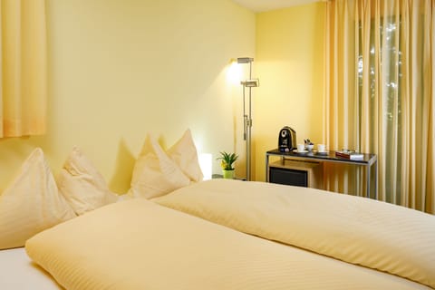 Double Room, Patio, Garden View | Minibar, in-room safe, desk, free WiFi