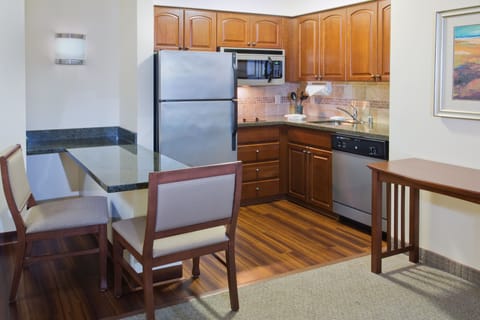 Suite, 2 Queen Beds | Private kitchen | Full-size fridge, microwave, stovetop, dishwasher