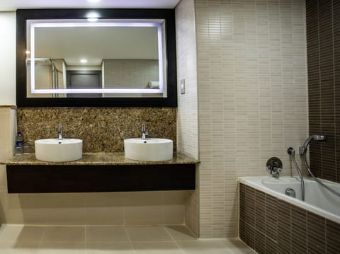 Junior Suite, 1 Bedroom | Bathroom | Eco-friendly toiletries, hair dryer, towels