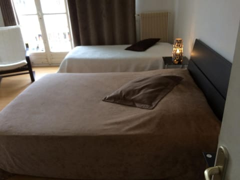 Premium bedding, blackout drapes, free WiFi, bed sheets