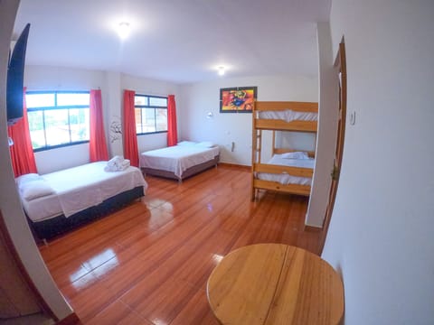 Family Quadruple Room, 1 Bedroom, Private Bathroom | In-room safe, desk, soundproofing, free WiFi