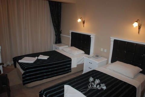 Standard Twin Room, Balcony | Bathroom | Shower, rainfall showerhead, hair dryer, slippers