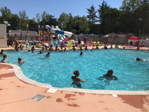 Seasonal outdoor pool, pool umbrellas, sun loungers