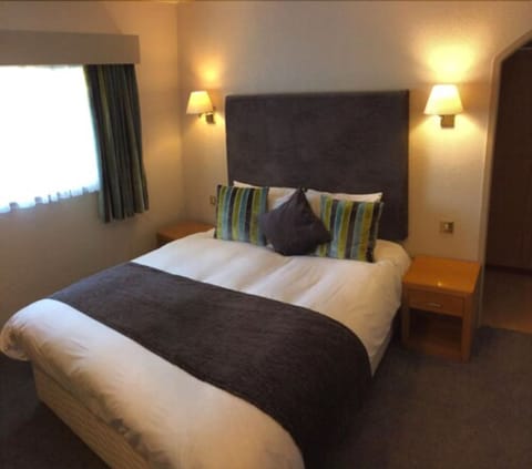 Standard Double Room | Desk, blackout drapes, iron/ironing board, free WiFi