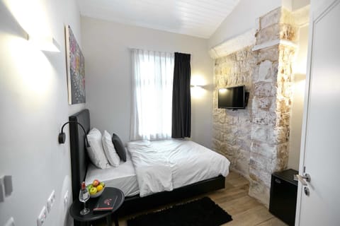 Economy Single Room | In-room safe, blackout drapes, iron/ironing board, free WiFi