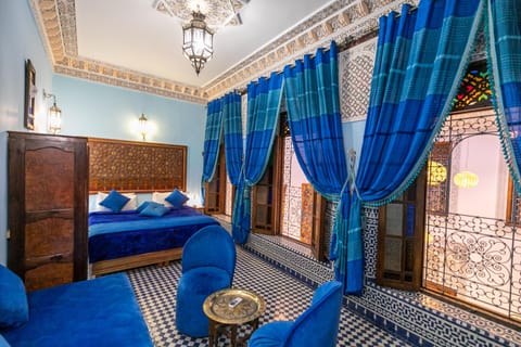 Deluxe Quadruple Room (Chefchaouen) | Premium bedding, minibar, in-room safe, iron/ironing board