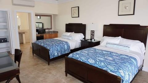 Standard Room, 2 Queen Beds, Non Smoking | In-room safe, desk, laptop workspace, iron/ironing board