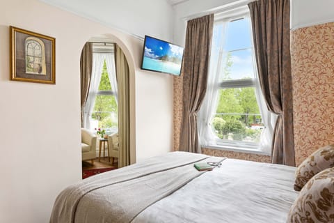 Junior Suite (First Floor Medium Suite) | Iron/ironing board, WiFi, bed sheets, alarm clocks