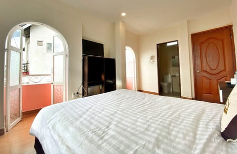 Family Quadruple Room, 2 Queen Beds, Balcony, City View | Minibar, desk, free WiFi