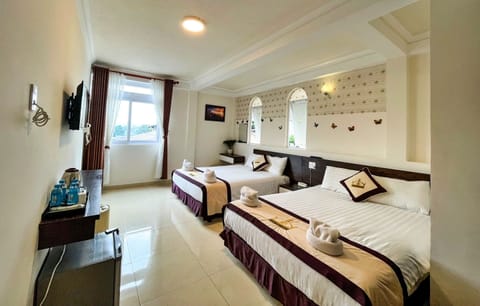 Family Twin Room, 2 Queen Beds, Non Smoking, City View | Minibar, desk, free WiFi