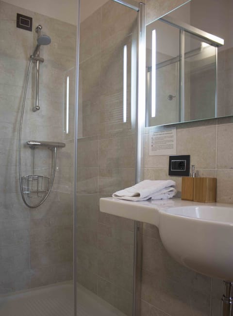 Comfort Single Room, 1 Large Twin Bed | Bathroom | Shower, rainfall showerhead, eco-friendly toiletries, hair dryer