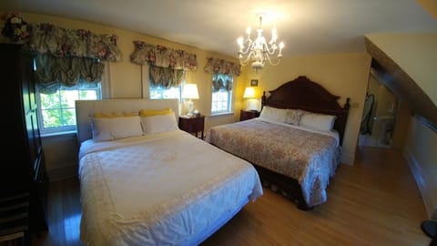 Family Room, 2 Bedrooms | Individually decorated, individually furnished, iron/ironing board