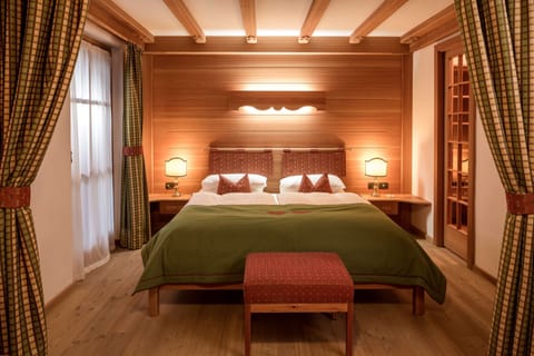 Premium bedding, down comforters, Select Comfort beds, minibar