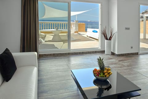 Superior Penthouse, Terrace, Sea View | Living area | 39-inch flat-screen TV with cable channels, TV, MP3 dock