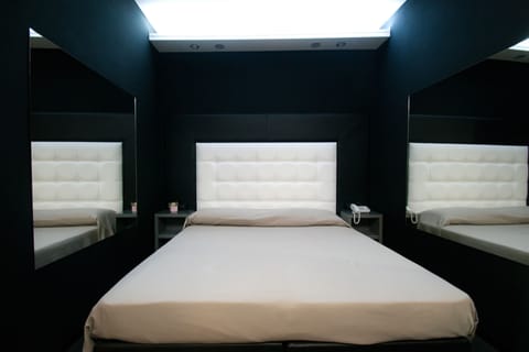 Egyptian cotton sheets, premium bedding, minibar, in-room safe