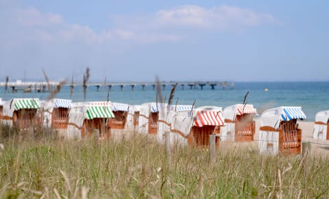 On the beach, sun loungers, beach umbrellas, beach towels