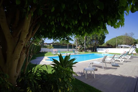 2 outdoor pools, pool umbrellas, sun loungers