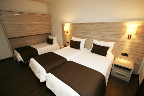 Triple Room | Premium bedding, down comforters, in-room safe, desk