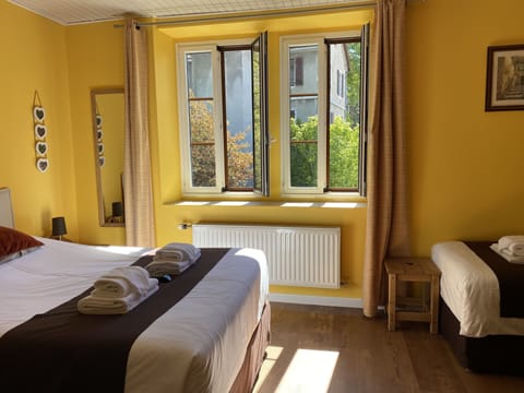 Standard Quadruple Room, 1 Bedroom | Desk, iron/ironing board, free WiFi, bed sheets