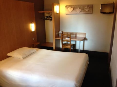 Desk, laptop workspace, blackout drapes, soundproofing