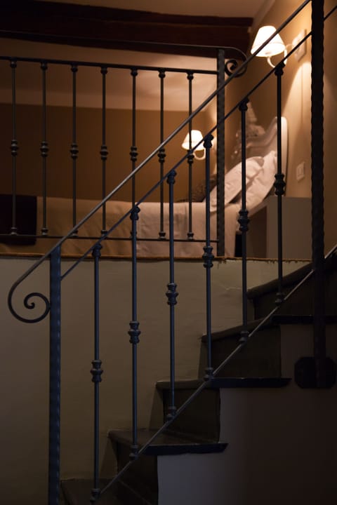 Deluxe Quadruple Room | Down comforters, minibar, in-room safe, desk