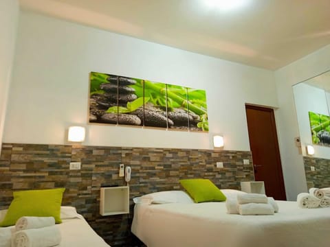 Basic Triple Room, 1 Bedroom | Down comforters, in-room safe, desk, free WiFi