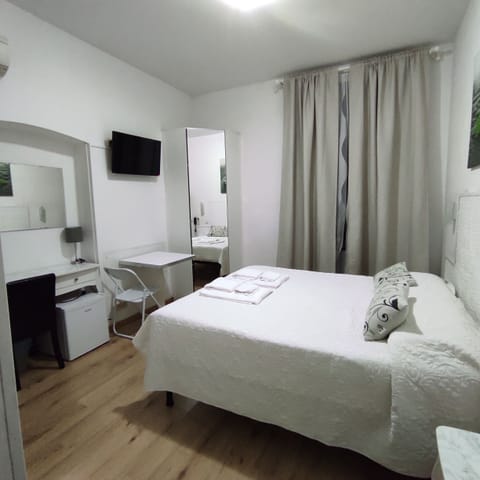 Basic Double Room, 1 Double or 2 Twin Beds, Non Smoking | Down comforters, in-room safe, desk, free WiFi