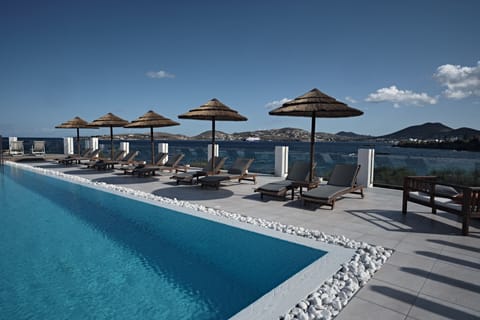 Seasonal outdoor pool, pool umbrellas, sun loungers