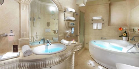 Junior Suite, Partial Sea View | Bathroom | Hair dryer, bidet, towels