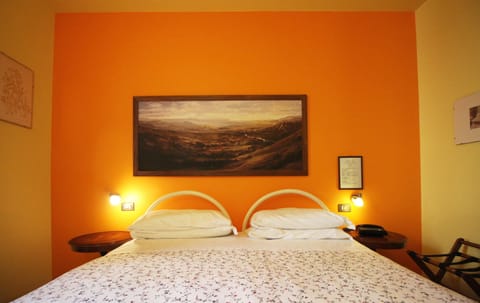 Double Room | Minibar, desk, iron/ironing board, free WiFi