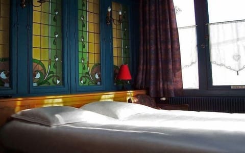 Desk, iron/ironing board, free cribs/infant beds, rollaway beds