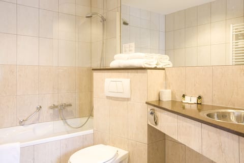 Shower, free toiletries, hair dryer, towels