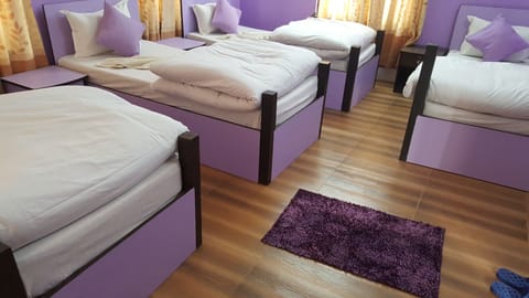 Family Quadruple Room, Multiple Beds (Shared Bathroom) | In-room safe, free WiFi