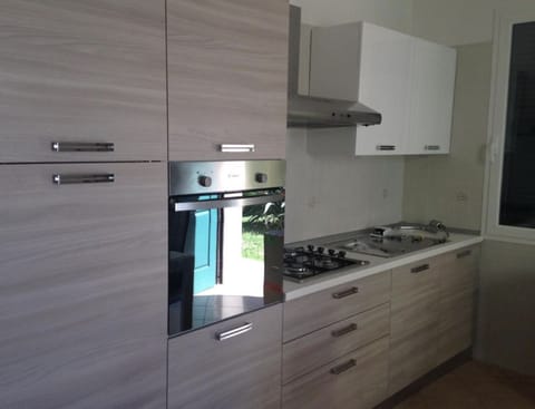 Villa, 2 Bedrooms, Kitchenette | Private kitchen | Full-size fridge, oven, stovetop, highchair