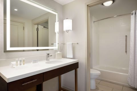 Studio, 2 Queen Beds, Non Smoking | Bathroom | Combined shower/tub, eco-friendly toiletries, hair dryer, towels