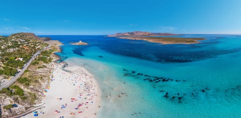 Beach nearby, white sand, beach umbrellas