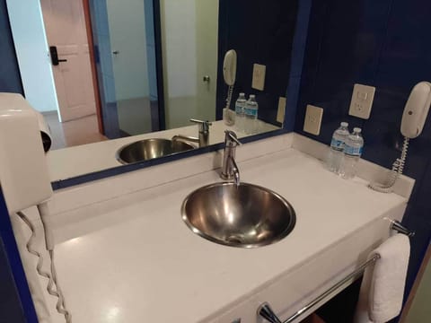 Shower, free toiletries, hair dryer, slippers