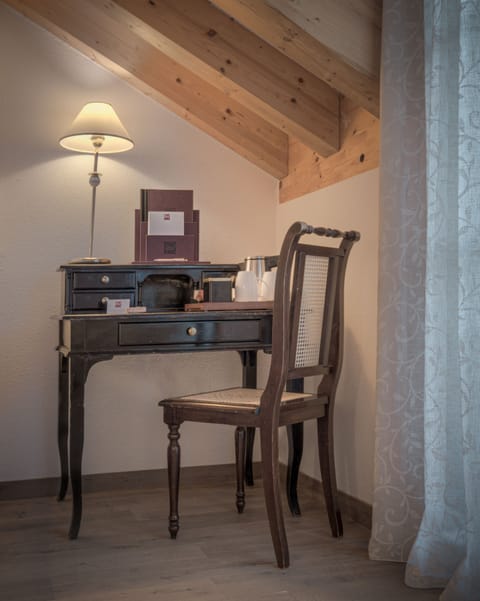 Family Room | Down comforters, minibar, in-room safe, individually decorated