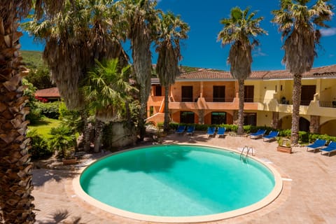 Seasonal outdoor pool, pool umbrellas