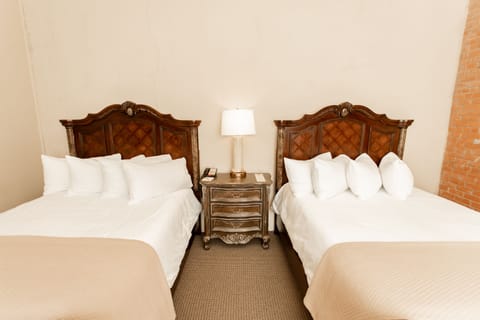 Standard Room, 2 Queen Beds | Frette Italian sheets, pillowtop beds, in-room safe