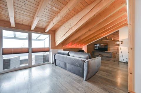 Apartment, Mountain View (Gehrenspitze) | Living area | Flat-screen TV