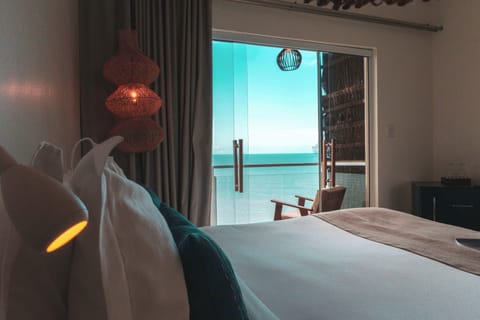 Deluxe Double Room, Jetted Tub, Sea View | Minibar, individually decorated, blackout drapes, iron/ironing board