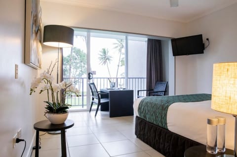 Beachfront Family Room | Premium bedding, blackout drapes, iron/ironing board, free WiFi