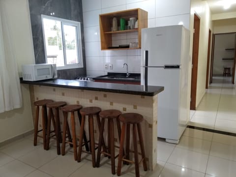 Traditional Apartment, 2 Bedrooms, Pool View | Private kitchen | Full-size fridge, microwave, oven, stovetop